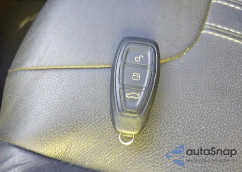 2012 Ford Focus Titanium z USA, uszkodzony, nr VIN 1FAHP3N25CL225033